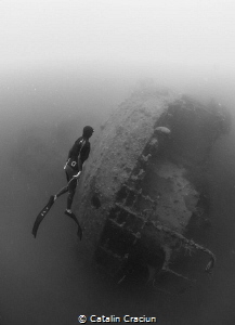 Freediver at Morazan Maru , Japanese WWII ship wreck in C... by Catalin Craciun 